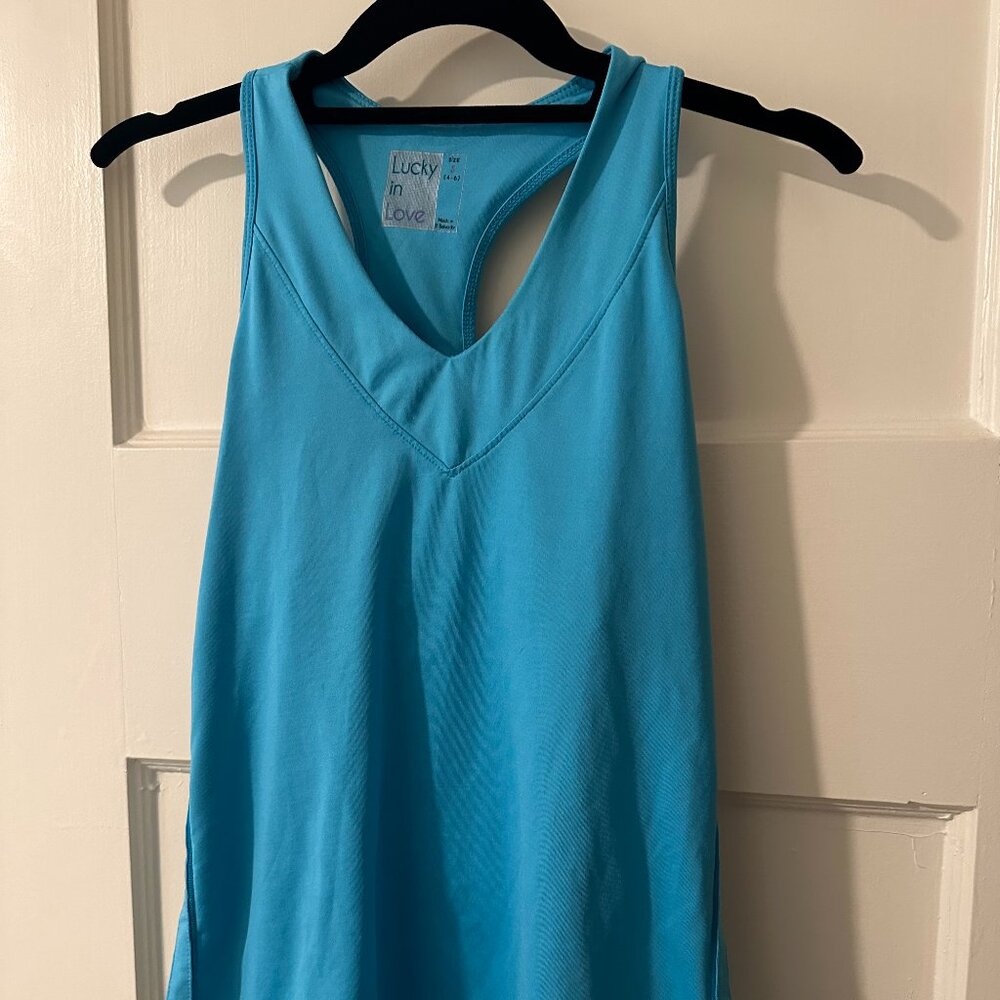 Lucky in Love stretch tennis top in turquoise, size S